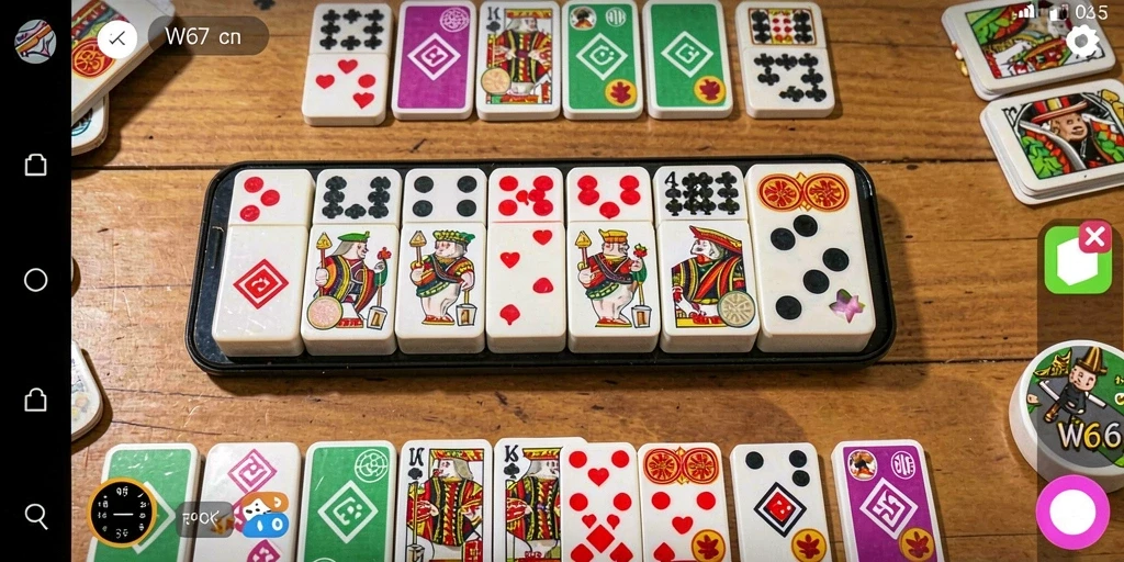 Screenshot gameplay W67 menunjukkan keseruan permainan Domino yang mengasyikkan.